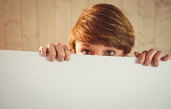 behind